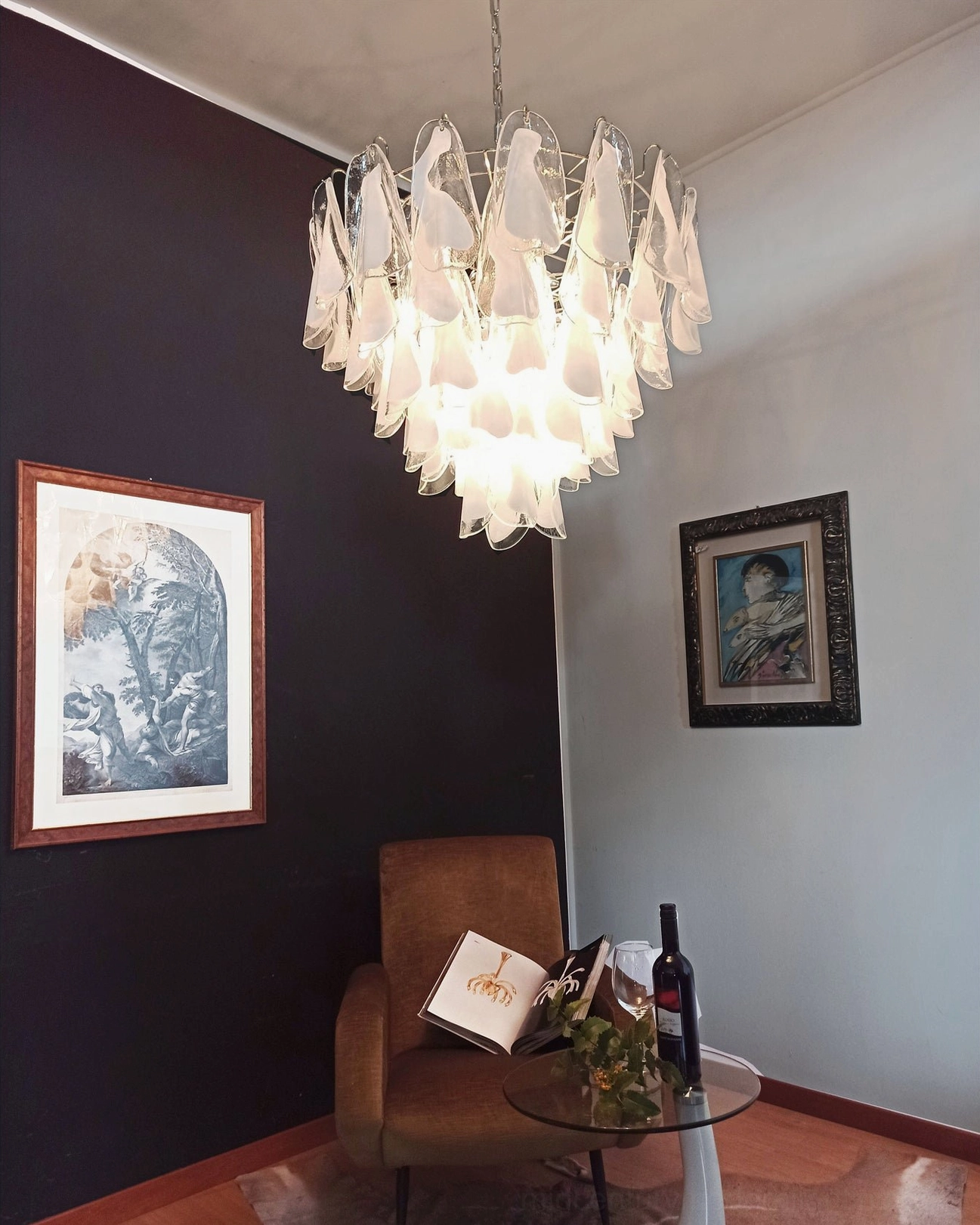 Aletta chandelier fully lit petal design exposed central bulb fixtures glowing