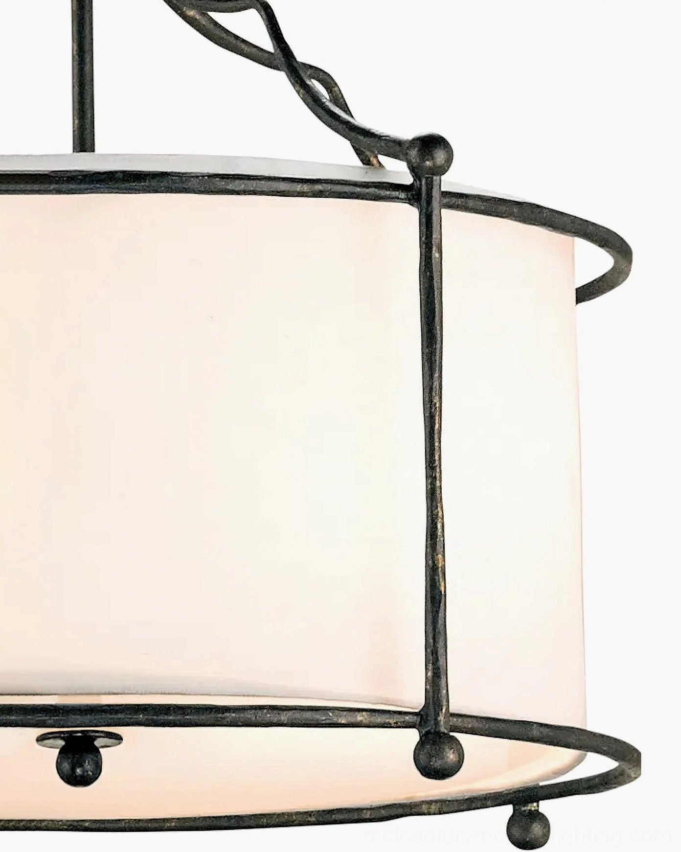 Close-up detail shot of Alexa pendant light frame and shade showing brass hardware and rustic metal finish