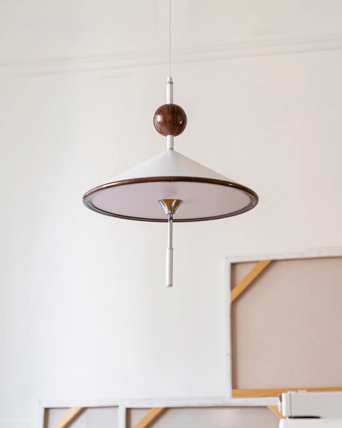Alien pendant lighting fixture in three-quarter view showing full sculptural form and warm illumination