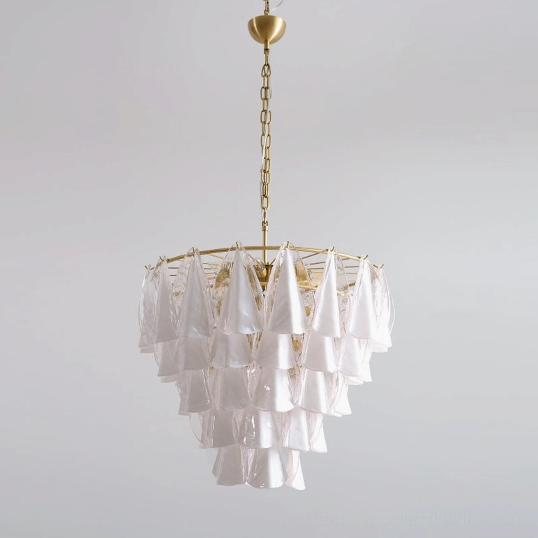 Alira tiered glass chandelier front close-up showing layered frosted glass petals and polished brass suspension chain detail