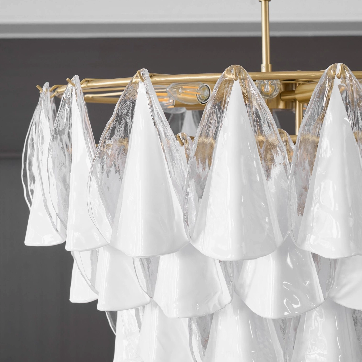 Alira white and gold glass chandelier variant, elegant display in contemporary home setting