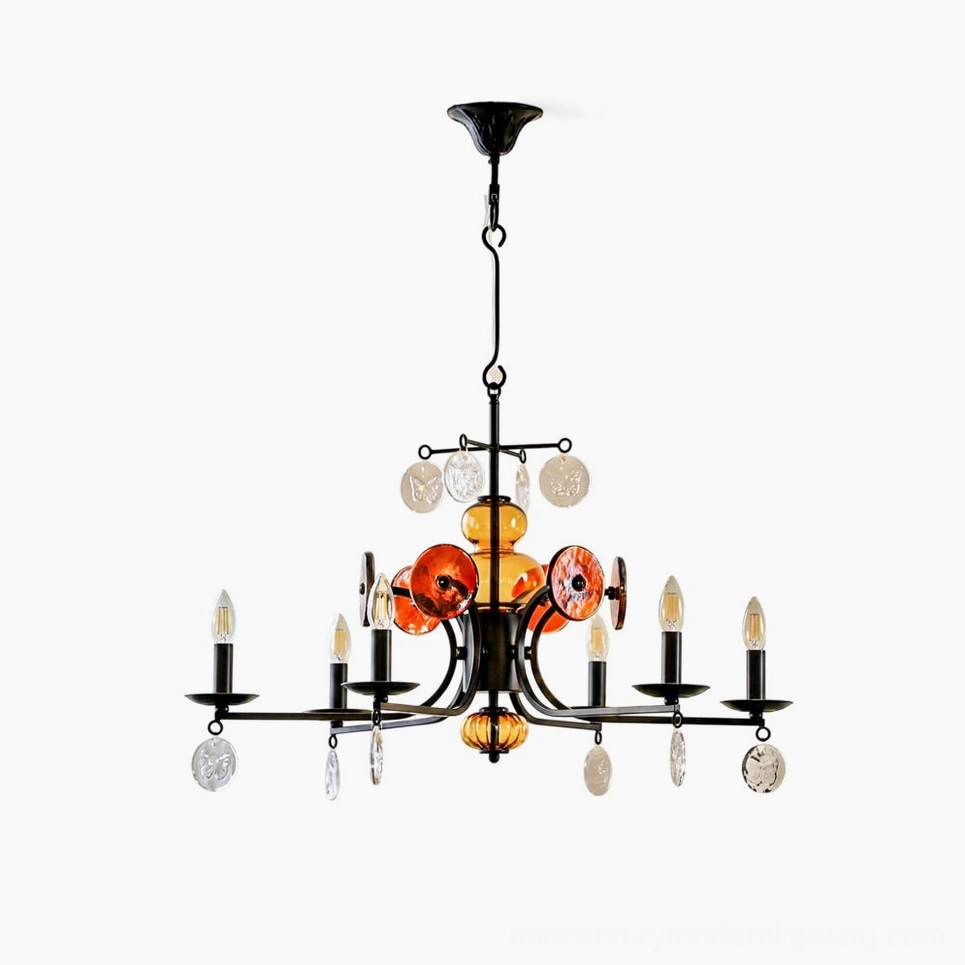 Alistair amber glass candle chandelier front studio view with black iron scrolled frame and hand-blown glass orbs