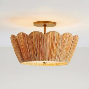 Close-up detail of Alitzel ceiling light showing hand-woven natural raffia texture and brass metal accents
