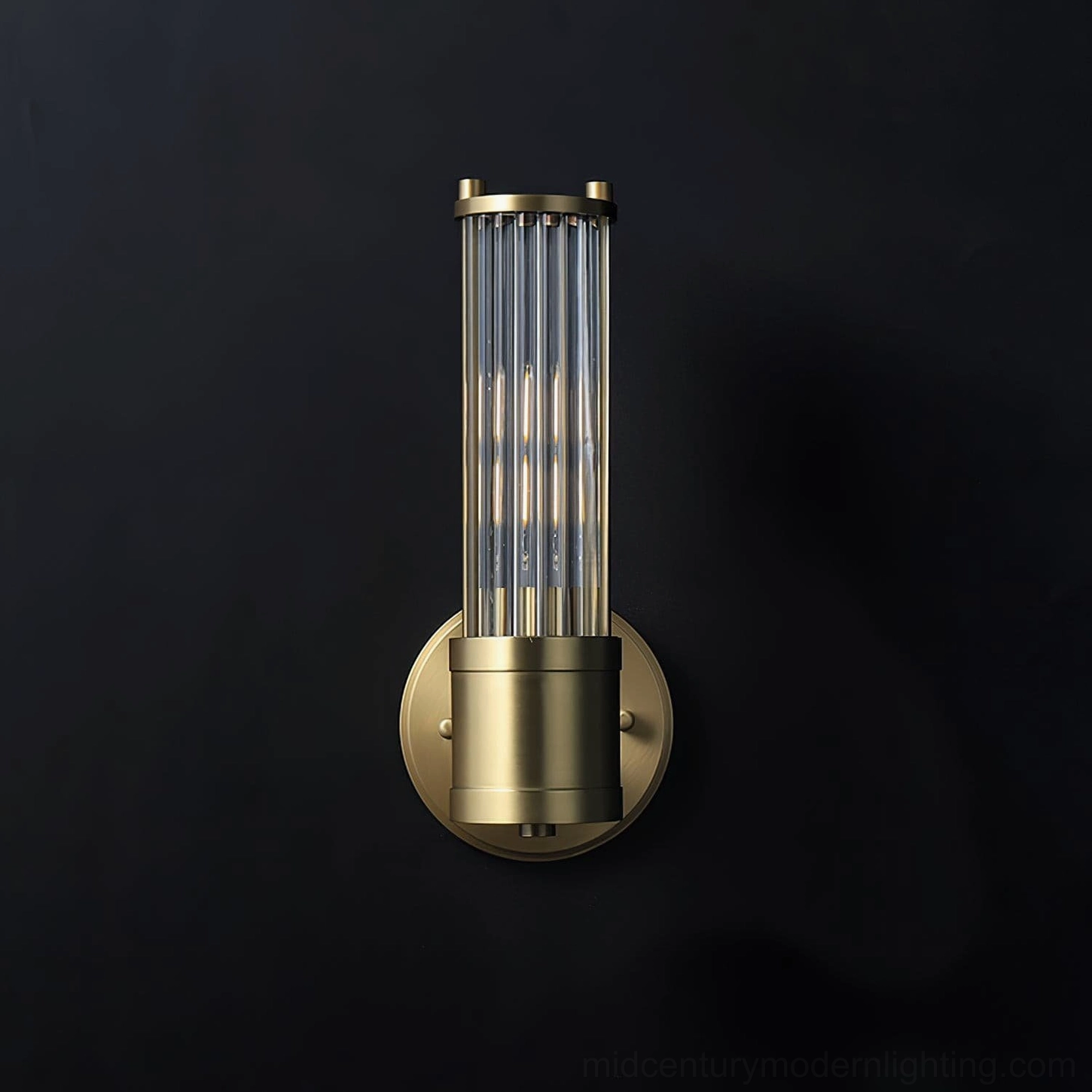 Close-up detail of Allen brass sconce showing brushed finish and crystal glass rod construction