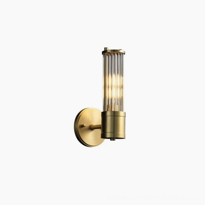 Allen brass wall sconce mounted on concrete wall demonstrating industrial-modern fusion style
