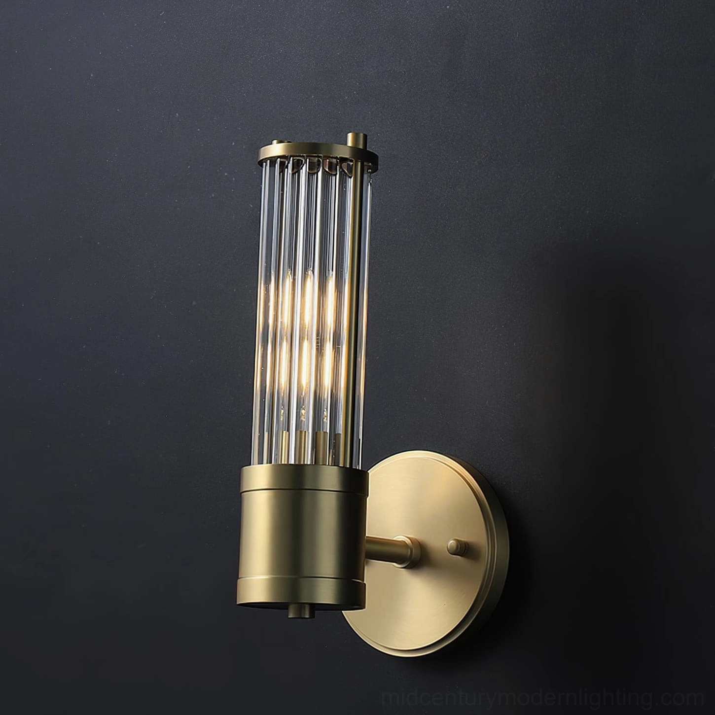 Allen brass wall sconce paired with modern furniture in luxury home interior