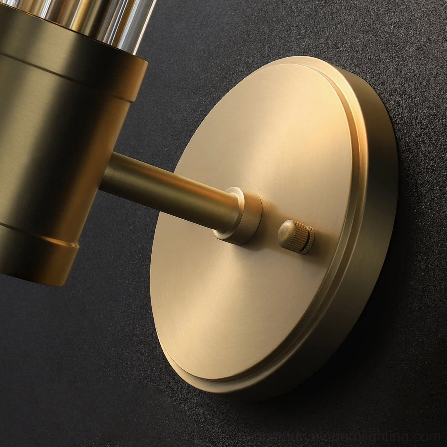 Allen mid-century modern wall sconce with warm brass finish and crystal glass elements