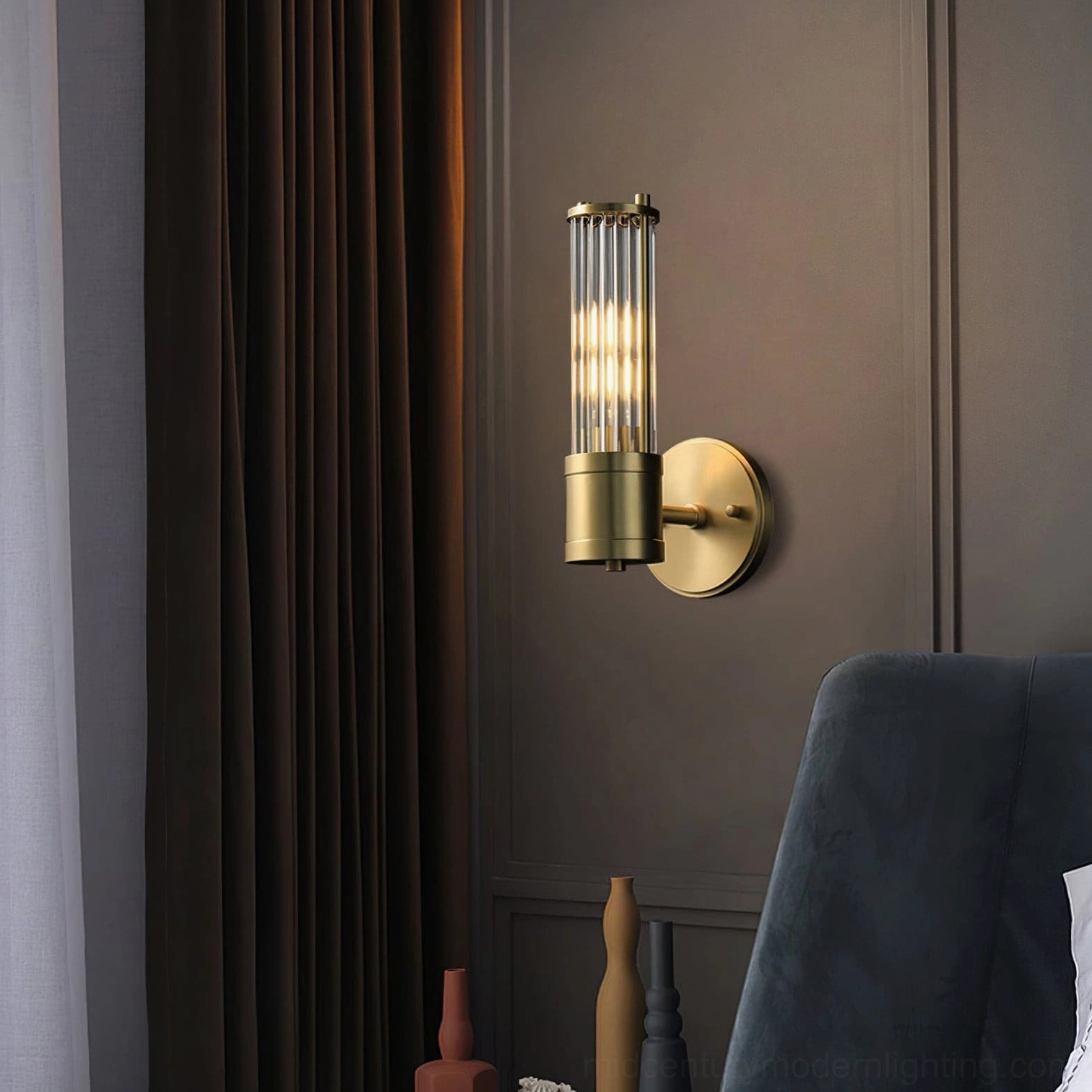 Allen wall sconce installed in luxury living room with warm ambient light and dark accent wall