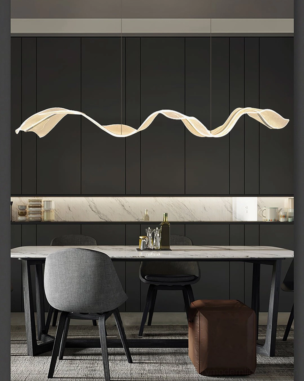 Alon pendant light illuminating dining bar counter with warm golden glow and modern minimalist aesthetic