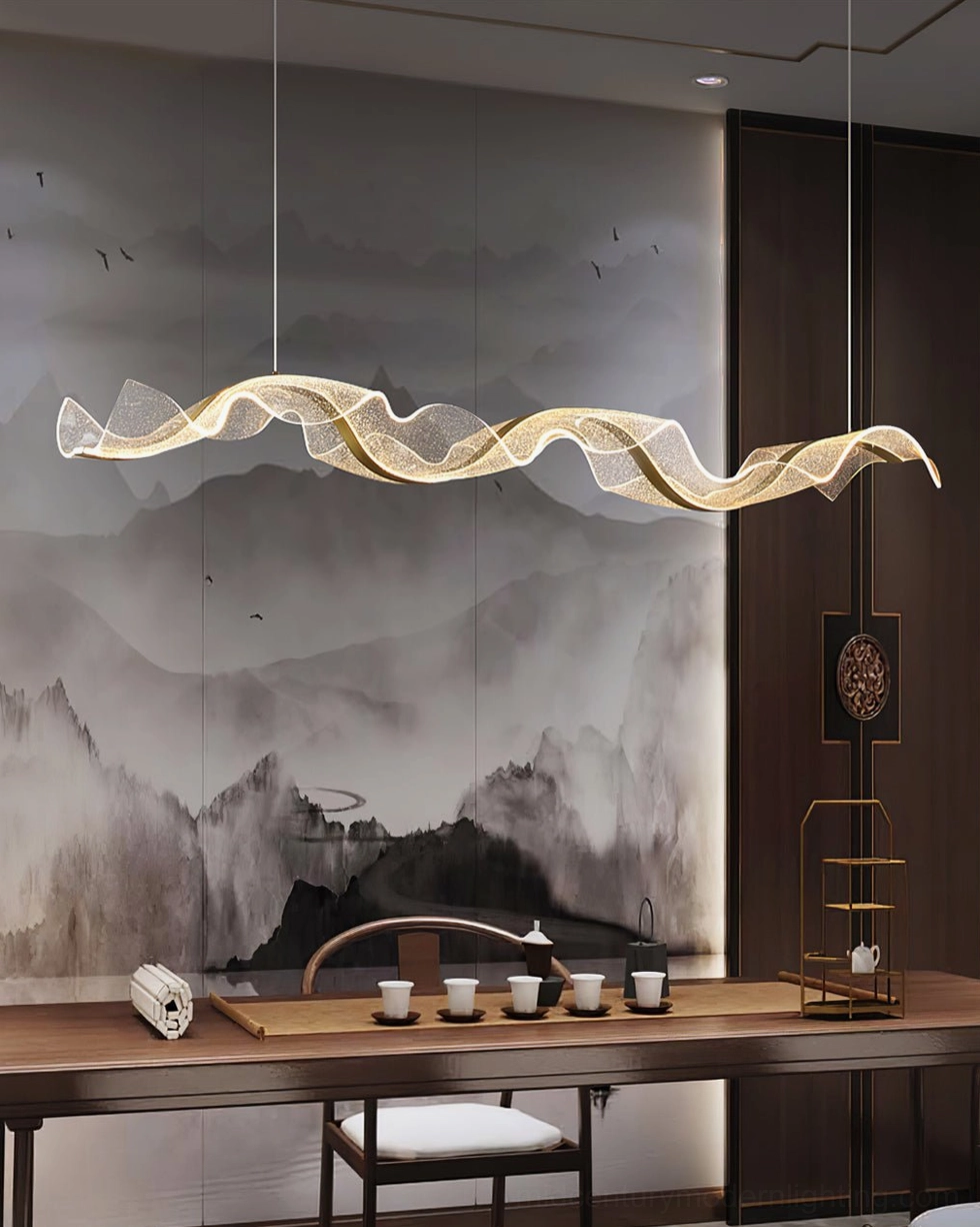 Alon pendant light overhead view illuminating luxury study space with warm ambient glow and ink landscape decor