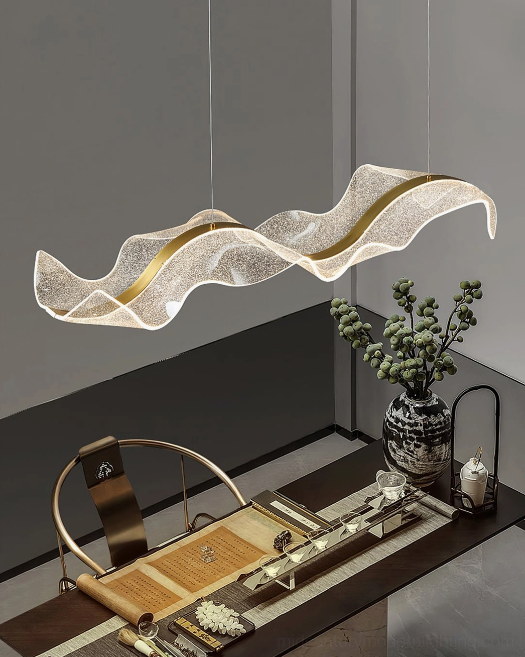 Alon linear pendant suspended above study area with dark wood panel walls and warm diffused illumination