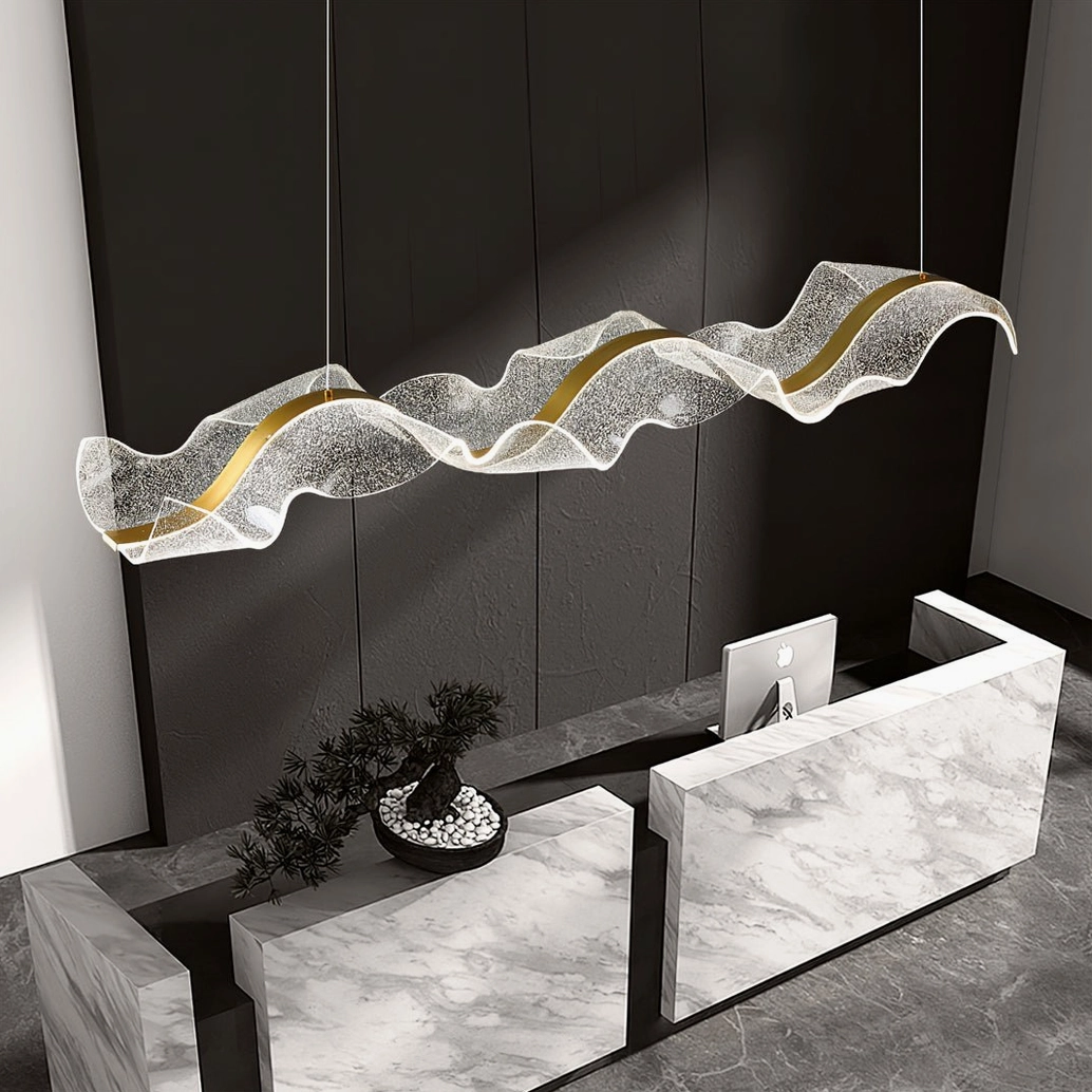 Alon Linear Chandelier product detail showing acrylic bubble finish, brass oval canopy and transparent suspension cables