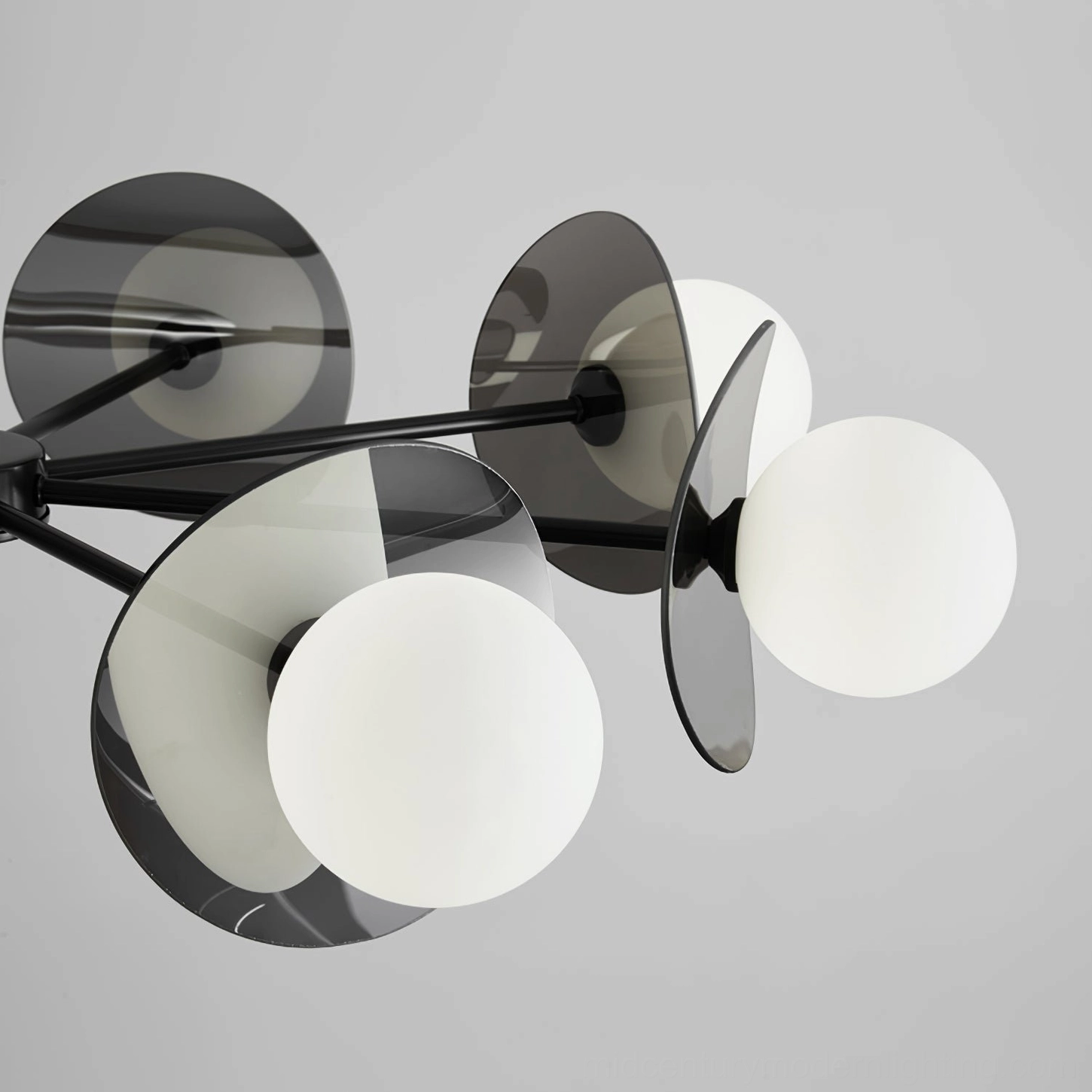 Alonso modern sputnik chandelier product display showing frosted glass sphere shades and black metal suspension system