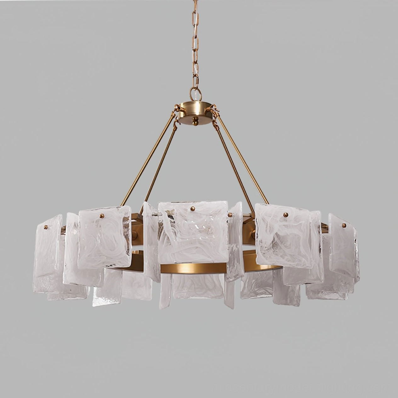 Overhead close-up detail of Alsona chandelier showing marbled white glass shades and brushed brass hardware joints
