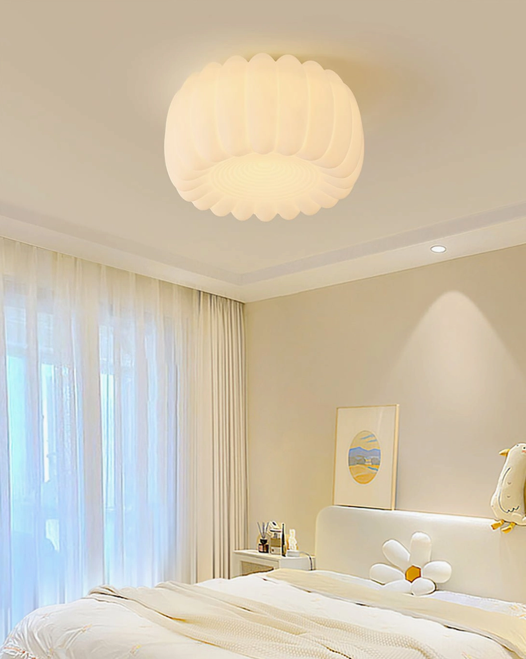 Alta ceiling light in bright bedroom with sheer curtains creating soft ambient illumination