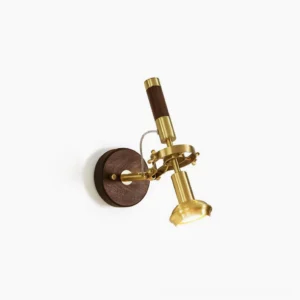 Altona brass walnut wall sconce studio shot - adjustable articulated arm design