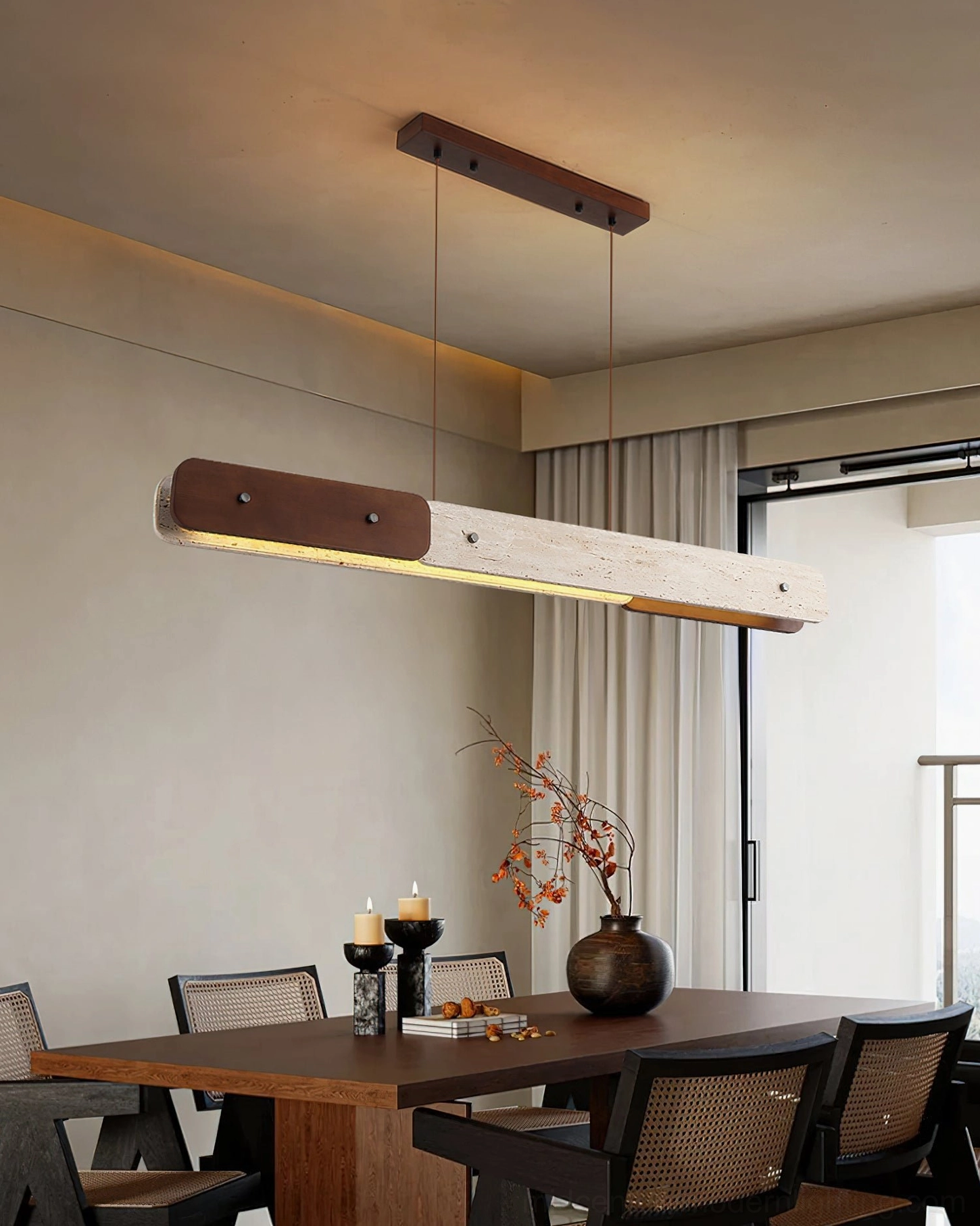 Aluet travertine pendant chandelier in residential apartment dining area with natural window light