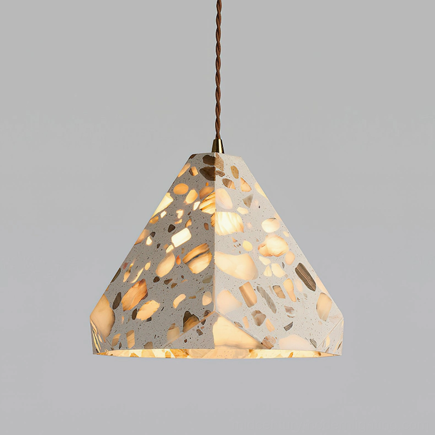 Alvaro stone pendant lamp front angle showing conical shade geometry and light transmission