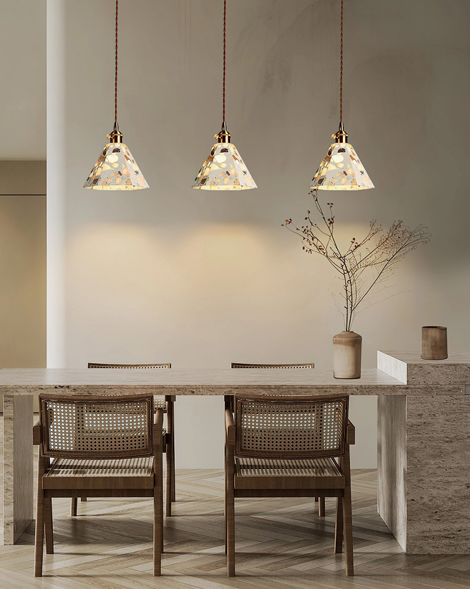 Alvaro terrazzo pendant suspended with fabric cord in neutral interior setting