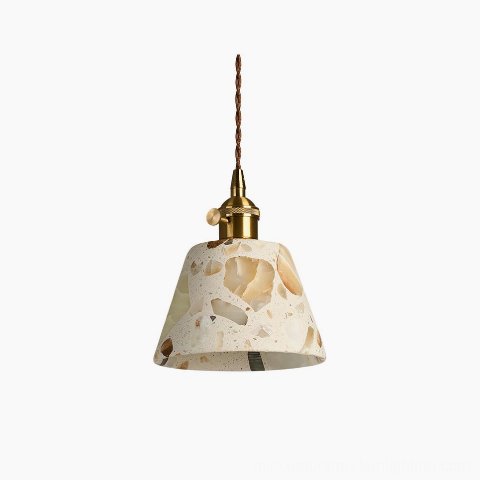 Alvaro translucent stone pendant lamp with brass hardware, front studio view showing terrazzo-like quartz aggregate pattern