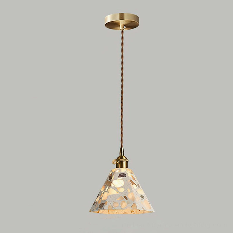 Alvaro large statement pendant Model G with expansive terrazzo stone shade in dining setting