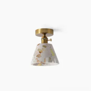 Alvaro terrazzo semi-flush ceiling lamp with amber-hued fragments in walnut and brass finish, frontal view against white background
