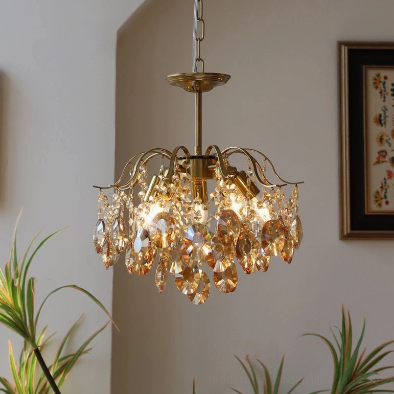 Amber crystal waterfall chandelier bedroom or intimate space setting, demonstrating warm ambient lighting capability