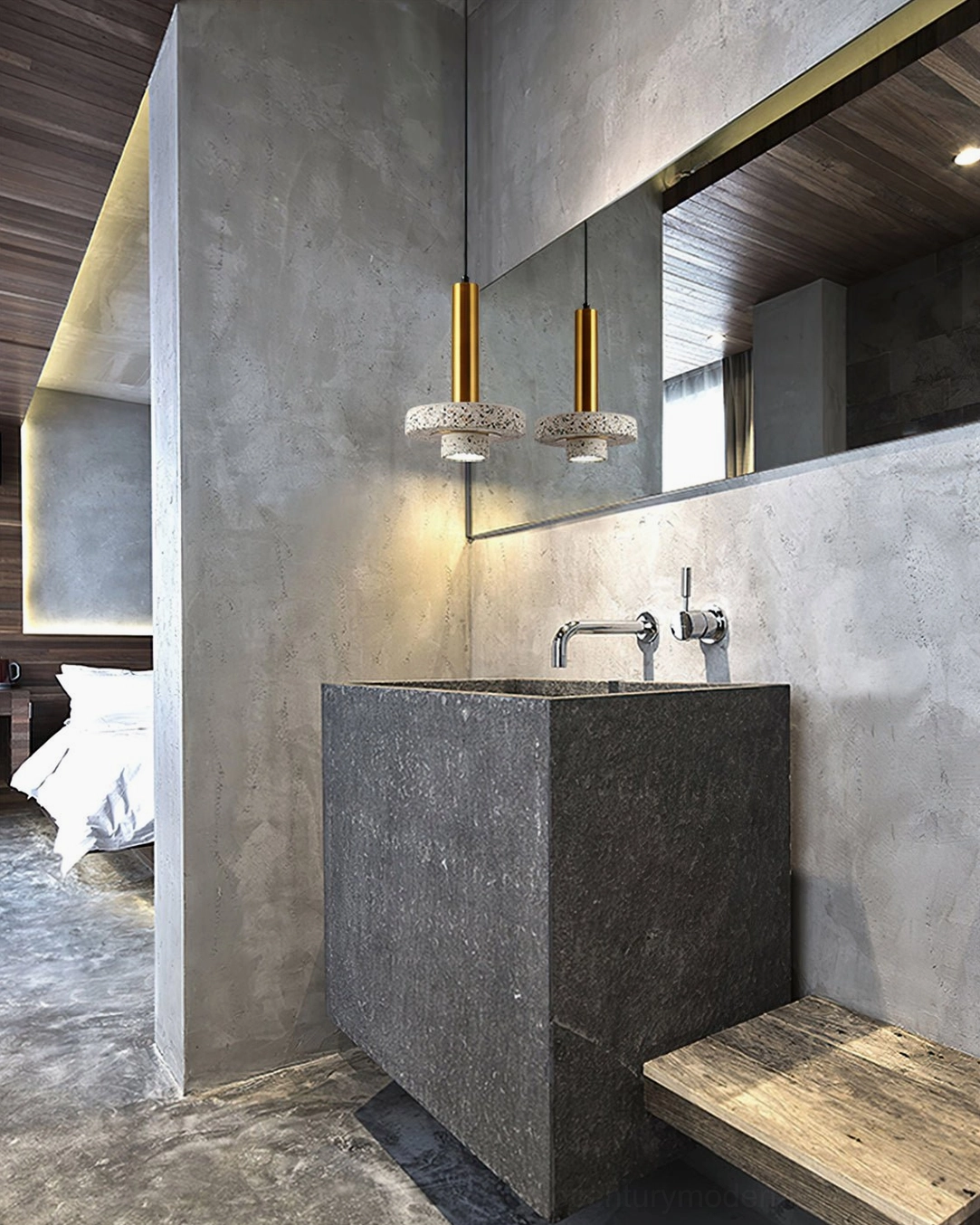Light grey terrazzo pendant lamp with brass metal parts in industrial style bathroom with concrete walls