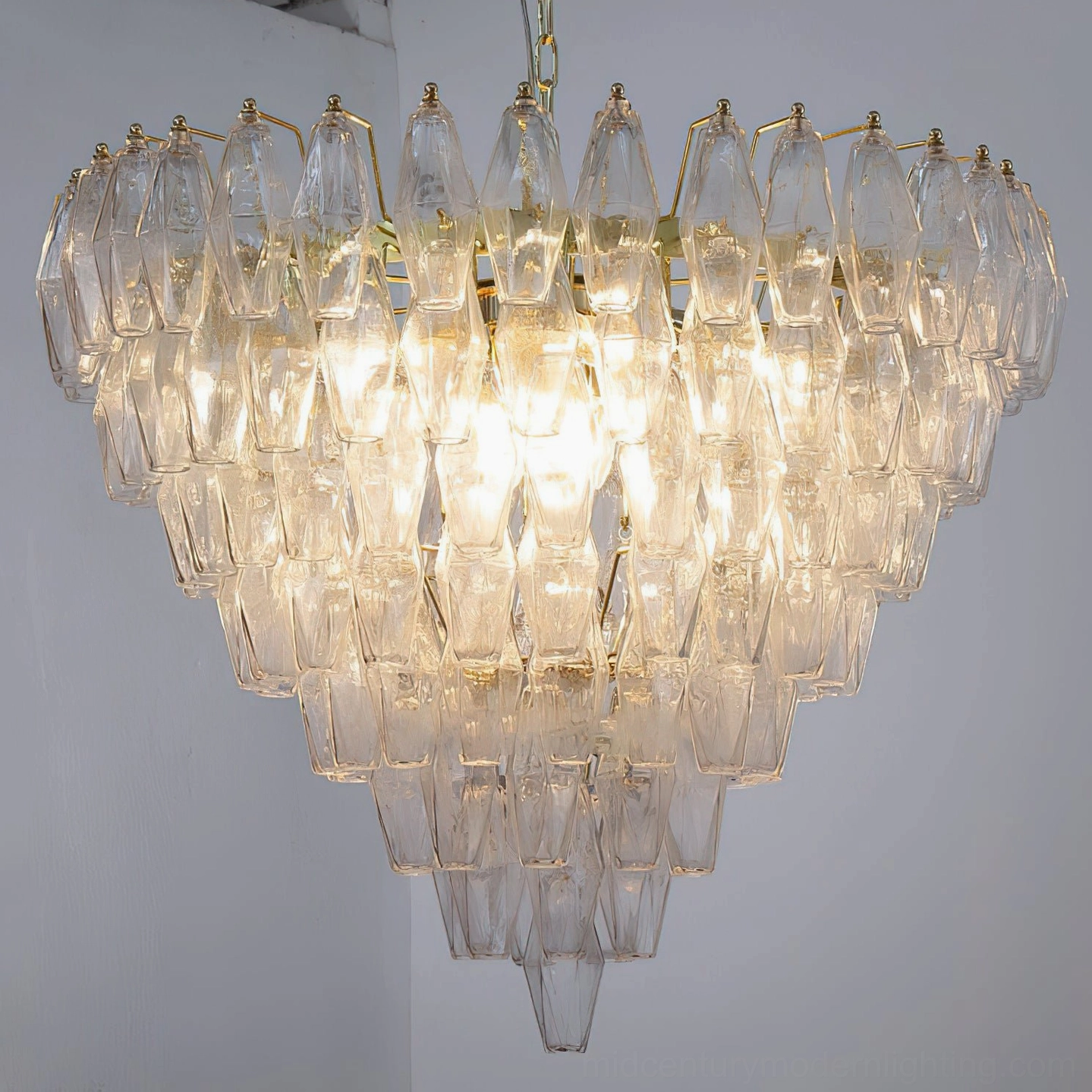 Ametista glass chandelier lighting test view showing how light refracts through layered prismatic glass structure