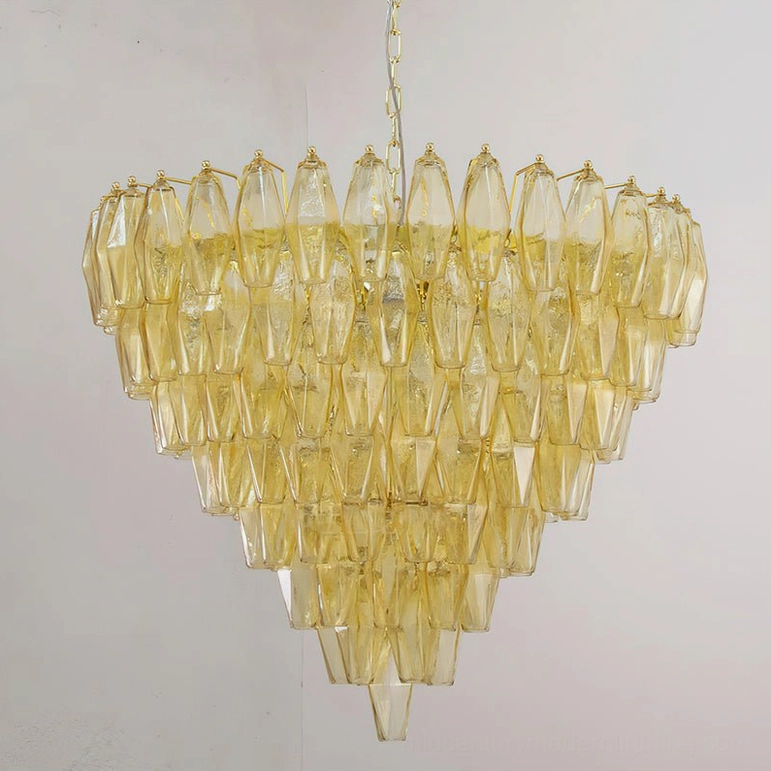 Pale yellow variant of Ametista geometric glass chandelier showing warm-toned polyhedral glass structure with gold metal accents