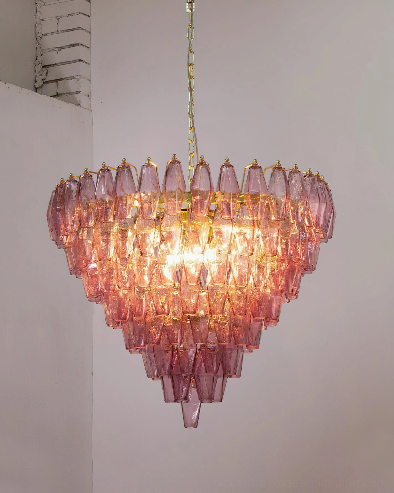 Ametista glass chandelier front view showing tiered glass pendant structure and pink gradient coloring against white background