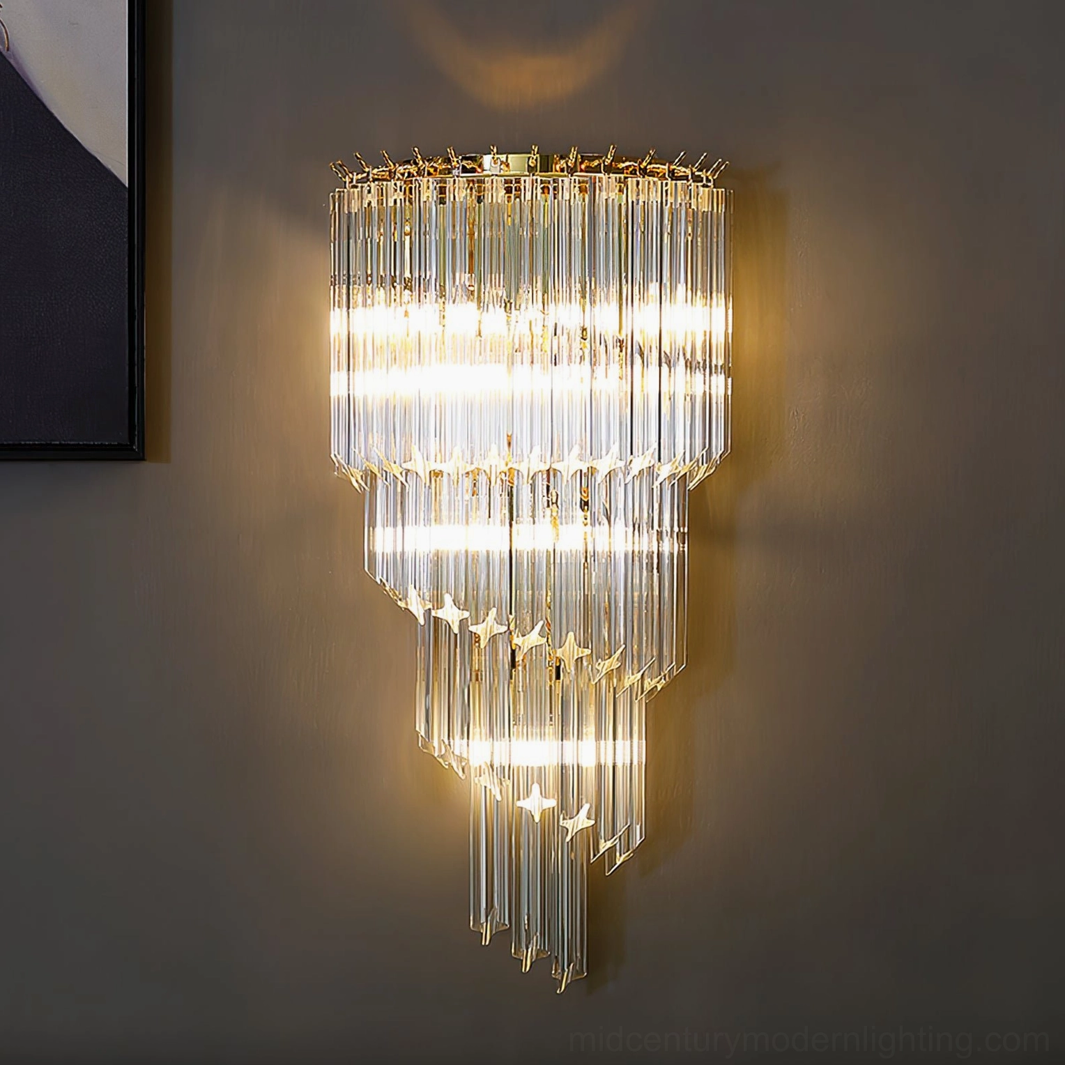 Paired Amici crystal wall sconces flanking bathroom vanity mirror, dual installation symmetrical arrangement