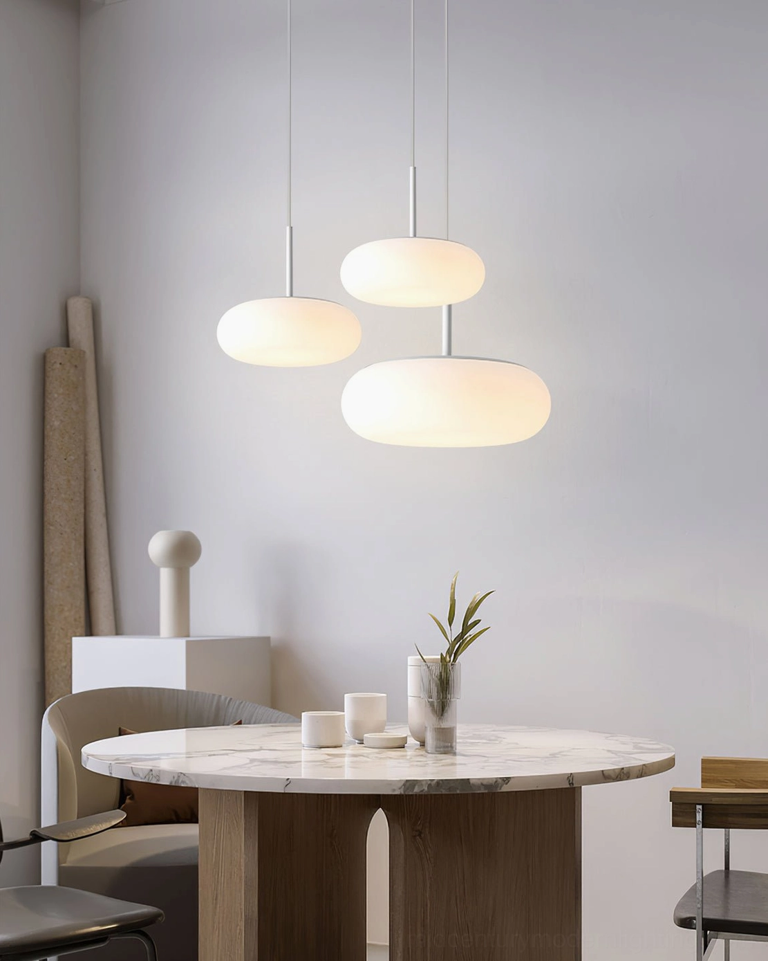 Amor white oval pendant lamp close-up view of glass diffuser quality and warm LED light output