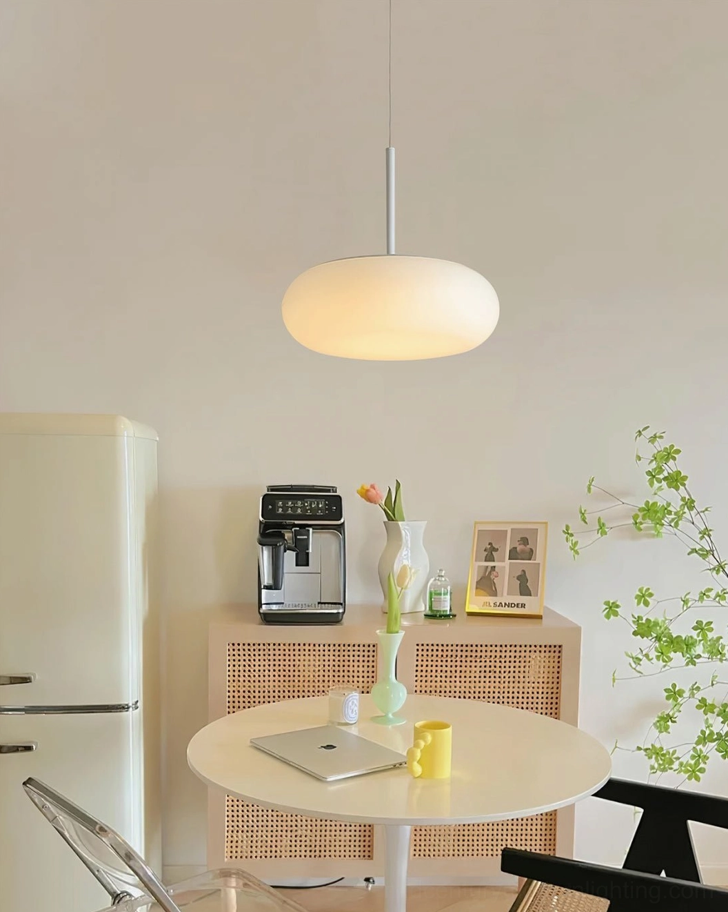 Amor pendant lamp installation showcasing interior design applications in contemporary minimalist spaces