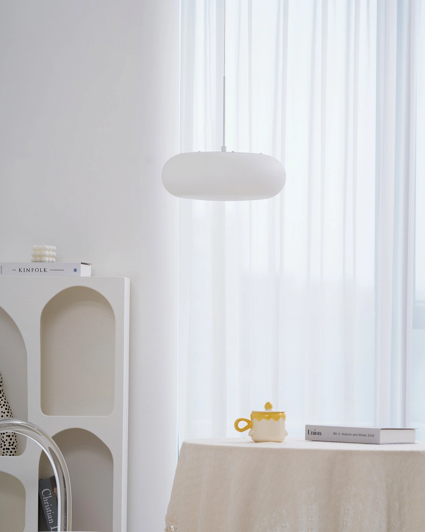 Amor white pendant lamp demonstrating size options and scalable pendant lighting solutions