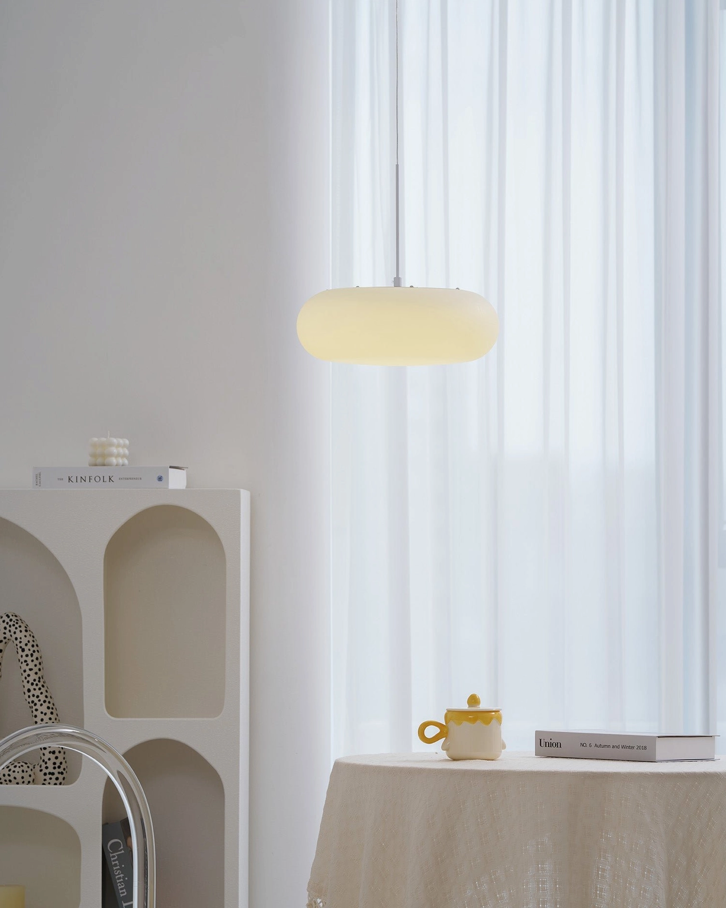 Amor white pendant lamp with metal suspension system and contemporary Scandinavian design details