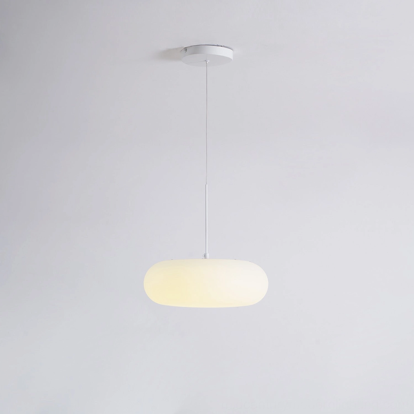Amor white oval pendant lamp interior design coordination with modern minimalist home decor