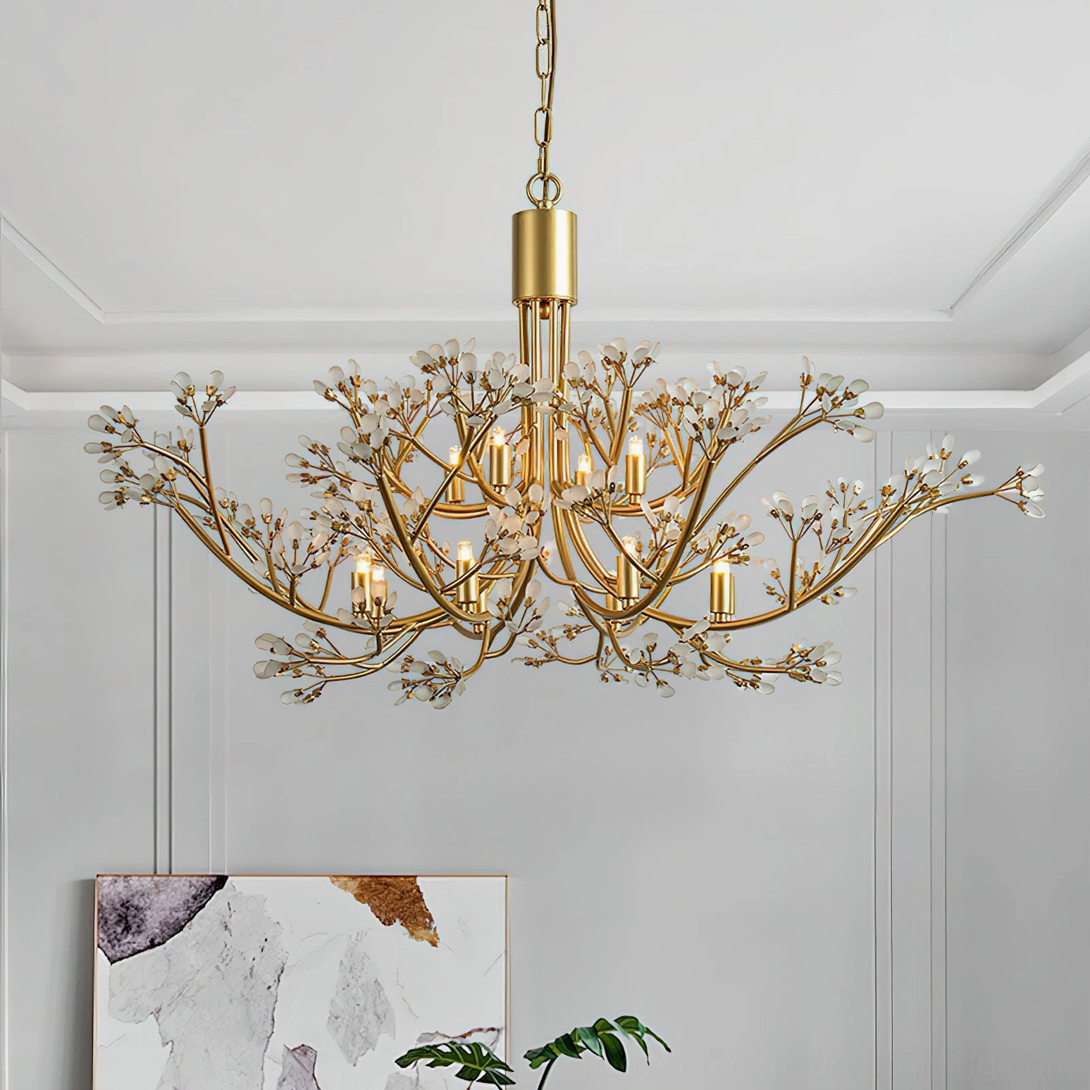 Anais mid-century modern crystal chandelier in living room with wall art, plant decor, and minimalist luxury aesthetic