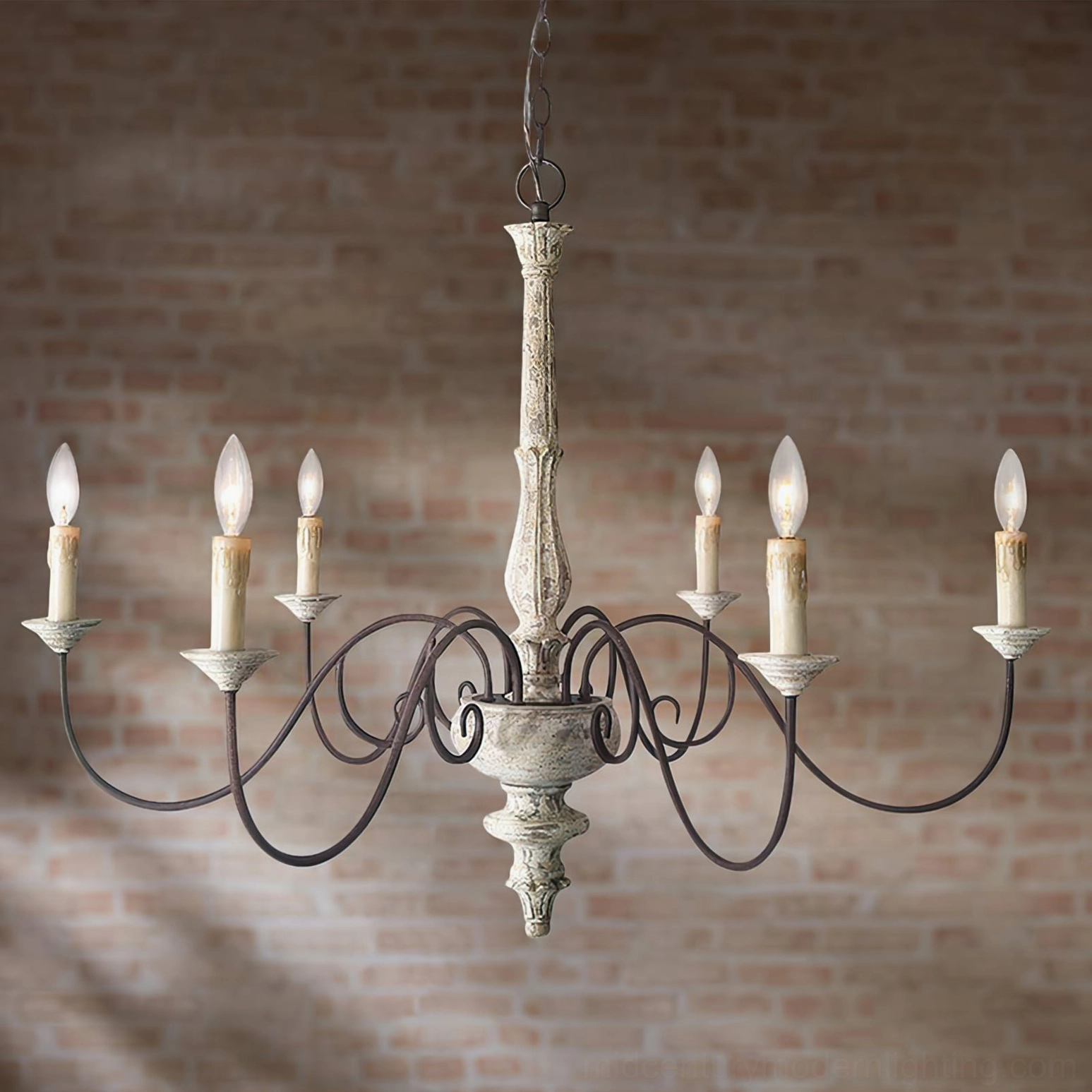 Anchor chandelier metal arm detail showing graceful curves and wrought iron craftsmanship