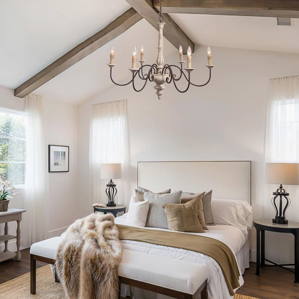 Six-head anchor chandelier installed in american farmhouse bedroom with wooden ceiling beams and neutral decor