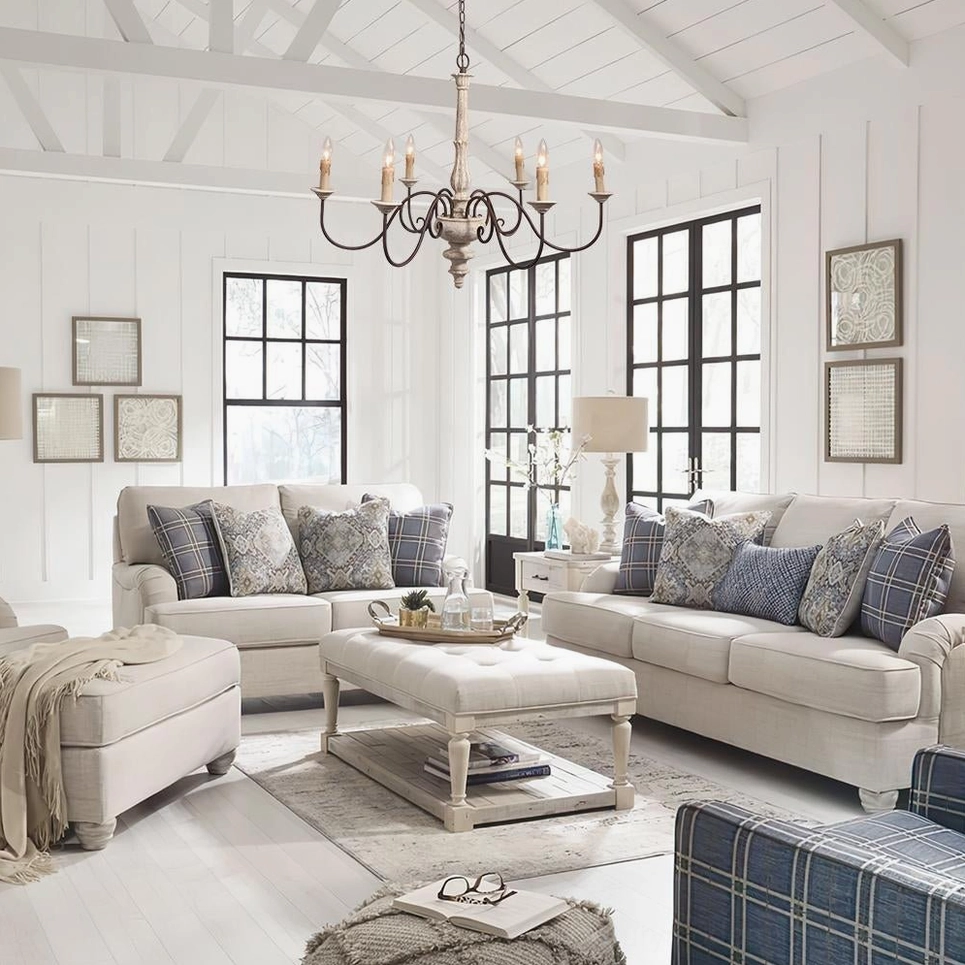 Anchor chandelier farmhouse pendant light creating ambient glow in spacious neutral living room setting