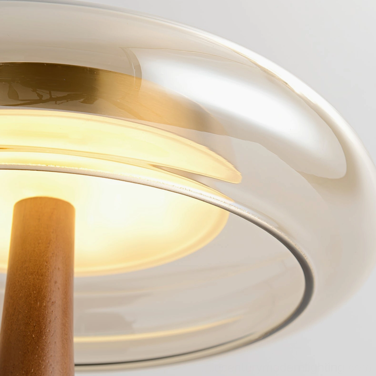Andi mid-century table lamp showing smoked glass shade and brass frame relationship