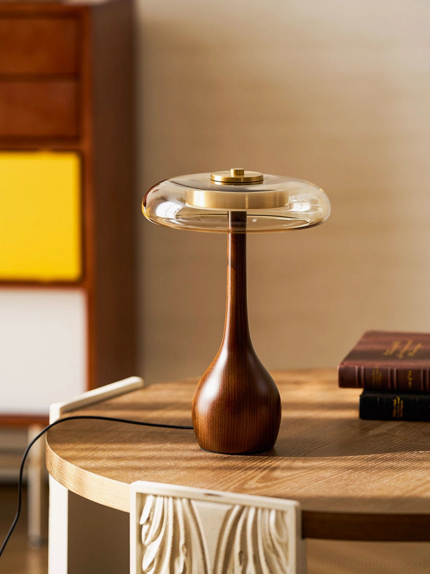 Andi mid-century glass lamp with wooden base in transitional living room interior