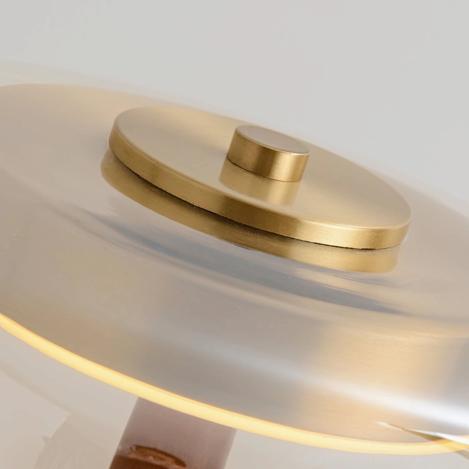 Andi Glass Table Lamp detail showing wooden base grain and brass connector