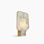Andrea alabaster table lamp with gold metal base and natural veined stone shade, three-quarter front view studio photography