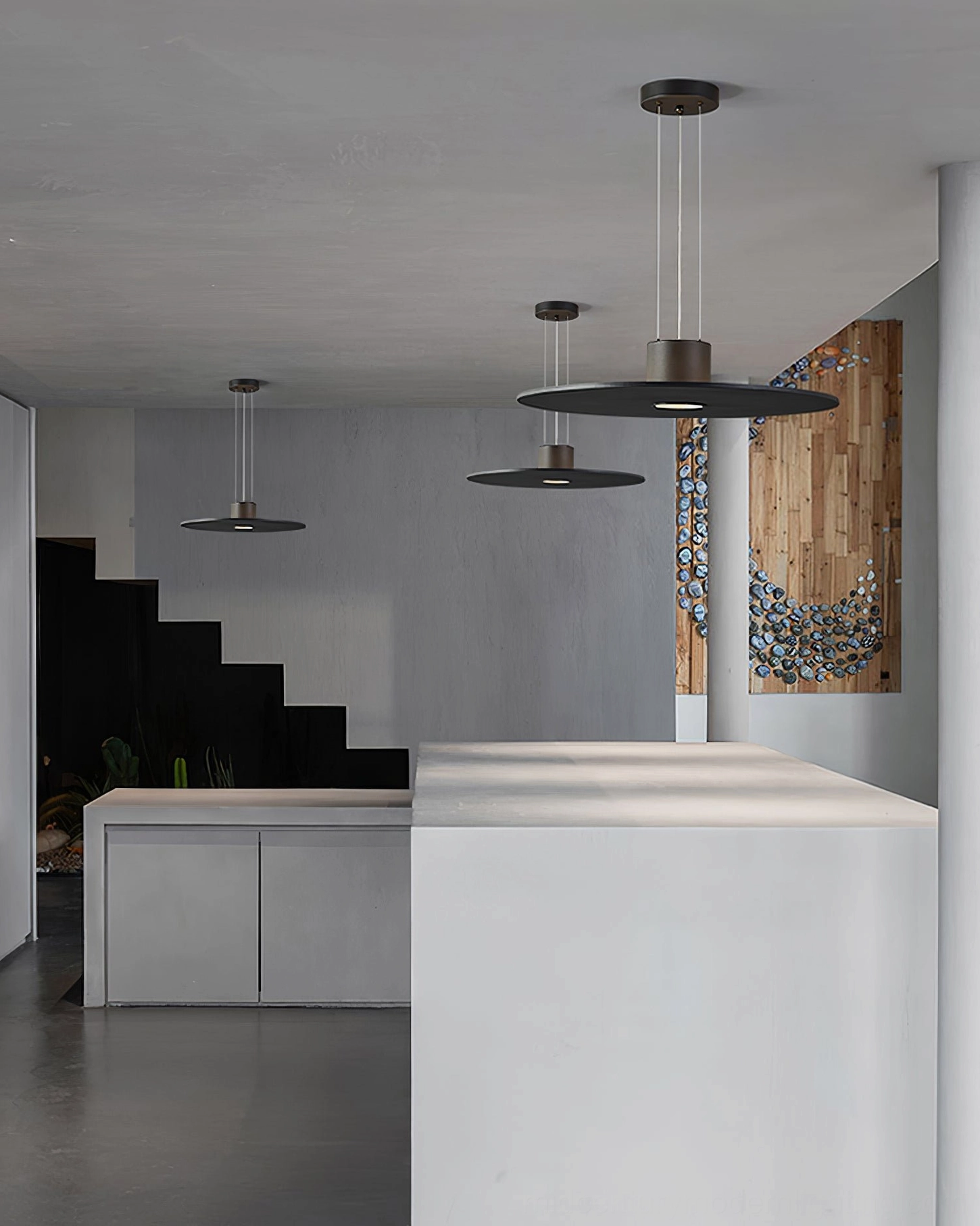 Multiple Andromeda disc pendant lamps open plan modern kitchen stairwell industrial minimalist