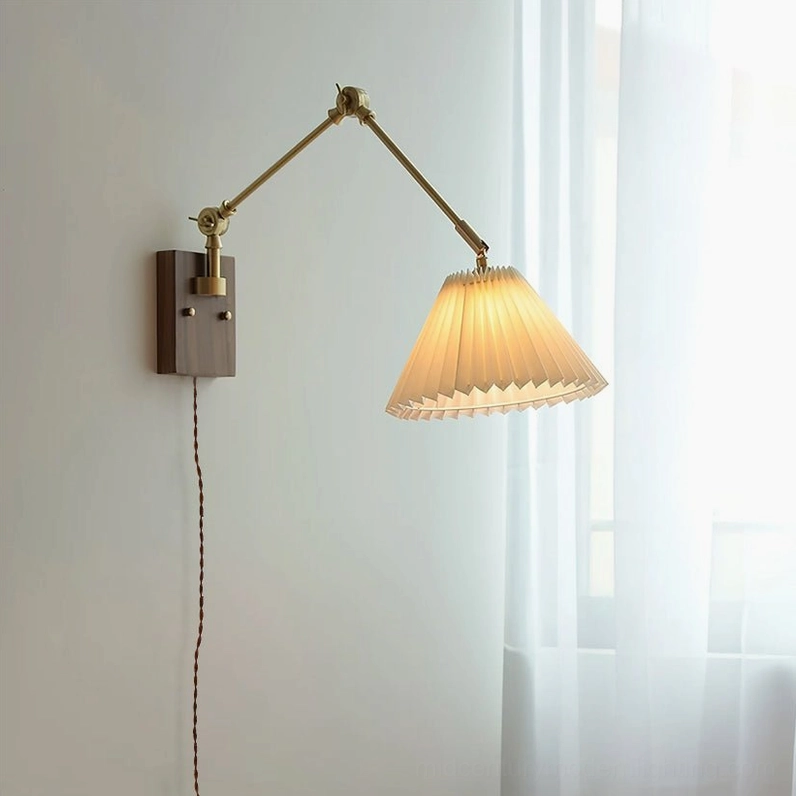 Angeline wall-mounted swing arm lamp in modern room setting, neutral minimalist interior with sheer curtains, adjustable arm extended