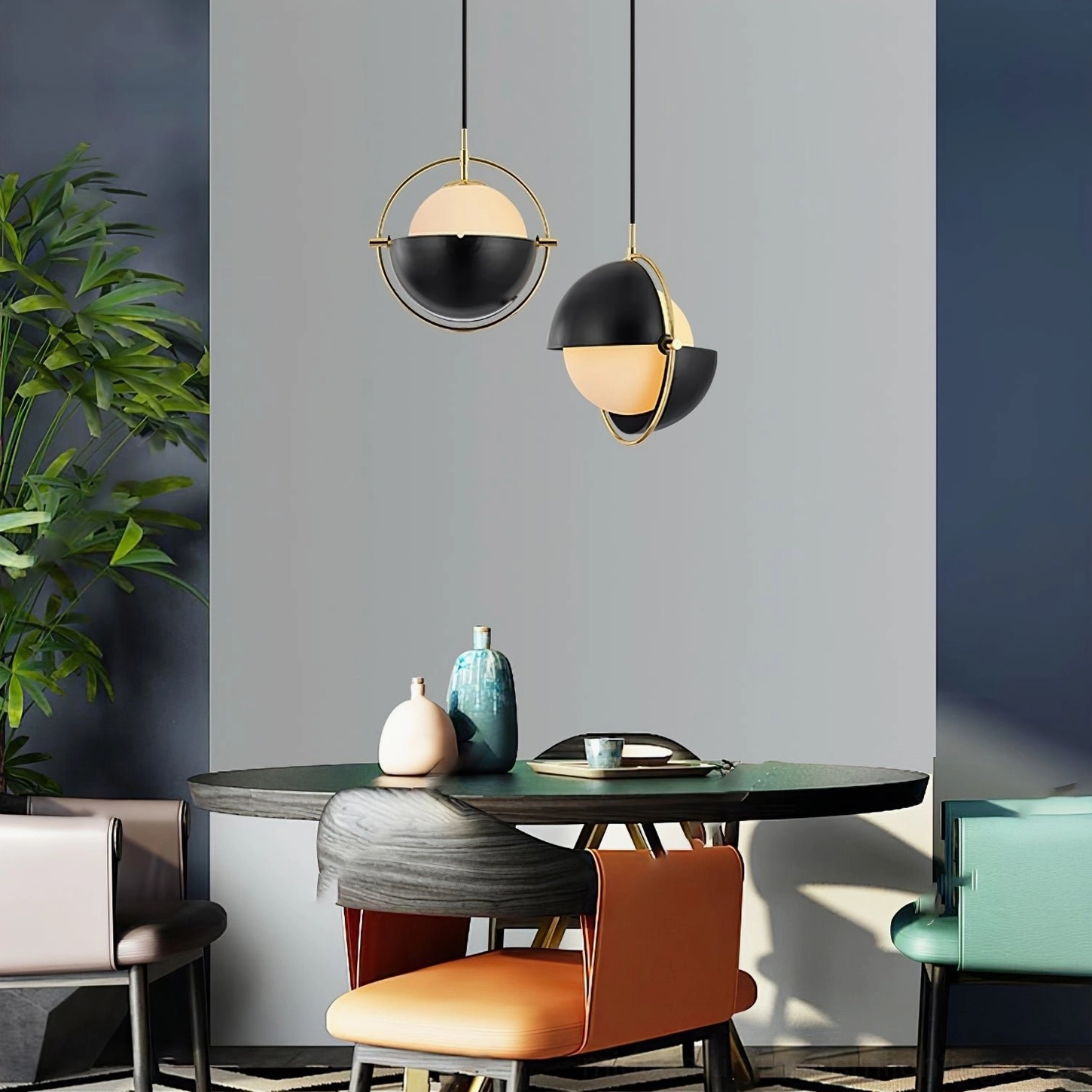 Anix interactive pendant lamp in blue-gold finish with rotatable hemisphere shade element