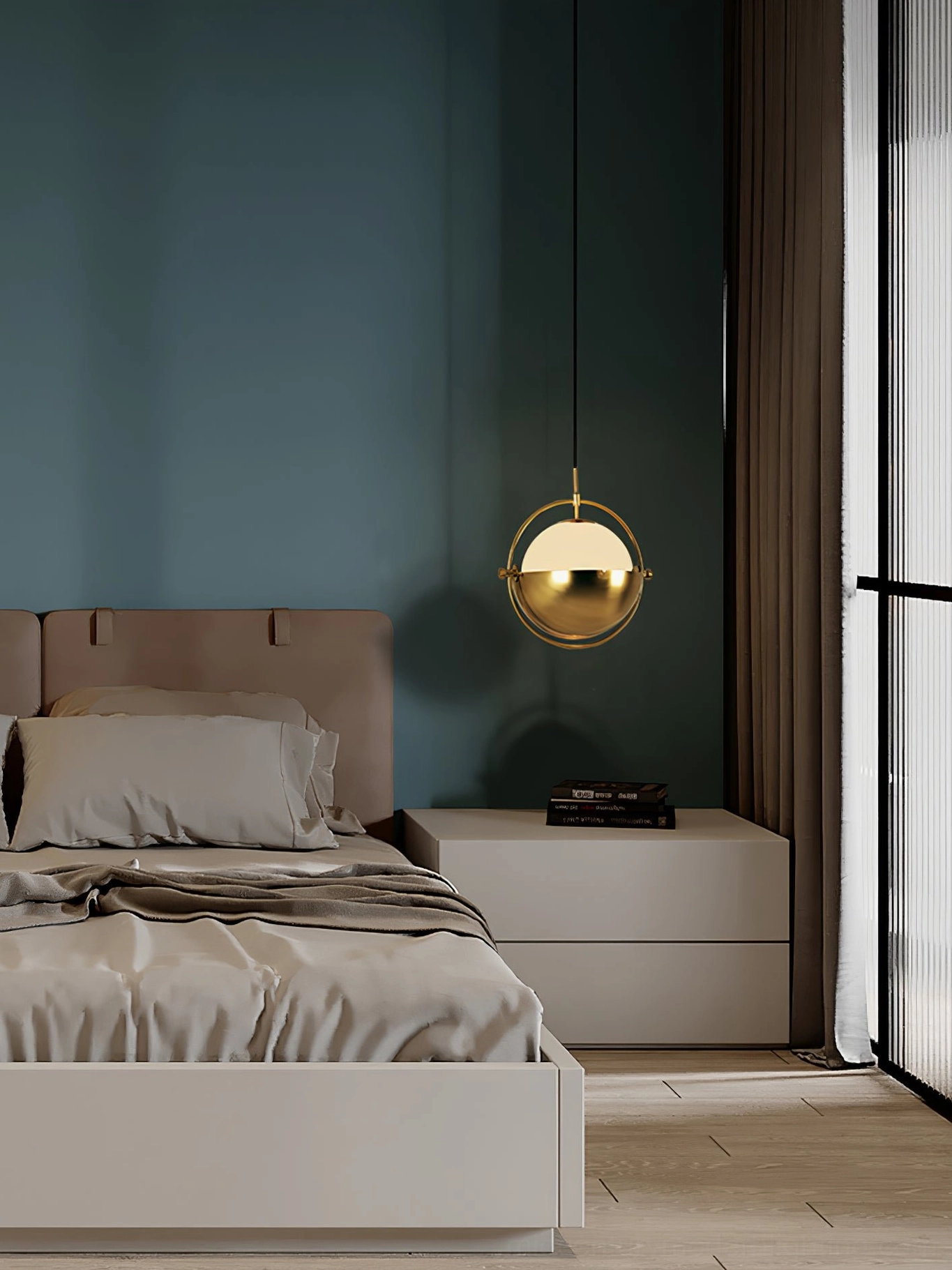 Brass Anix pendant light positioned as bedside lighting above nightstand with warm minimalist style