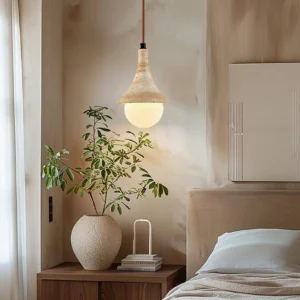 Annadel pendant light in warm bedroom setting creating intimate ambient lighting over bedside table